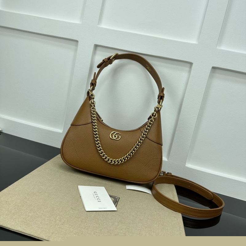 G*u*i top handle bags
